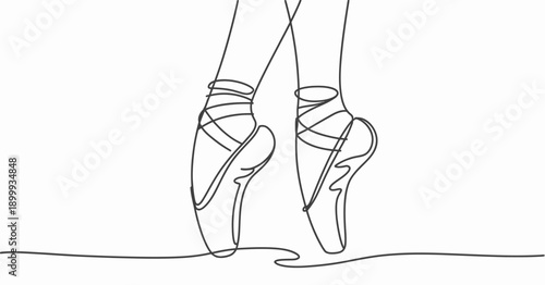 Graceful ballet dancer captured in a delicate pose with pointe shoes.