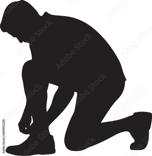 Black silhouette of person kneeling and tying shoelaces