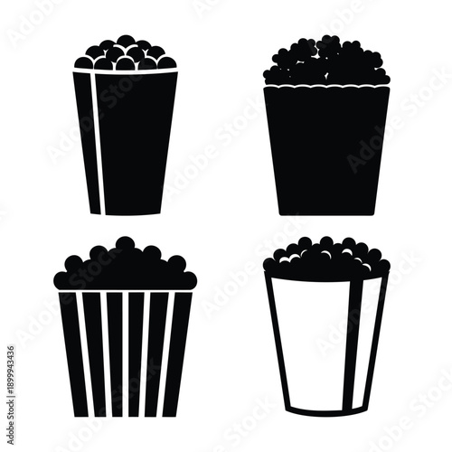 Set of four simple black and white vector icons illustrating classic movie theater popcorn buckets