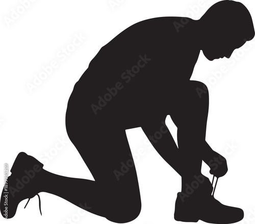 Silhouette of Person Tying Shoelaces in Kneeling Position