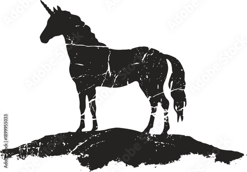 Black silhouette of a unicorn standing on a hill with a textured, vintage effect