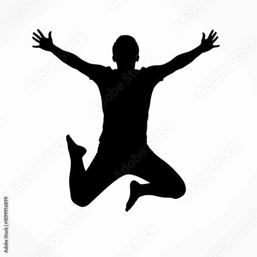 Silhouette of joyful person jumping with arms outstretched in mid-air