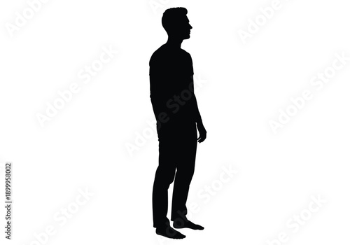 Full length silhouette of a young man standing and looking away against a white background