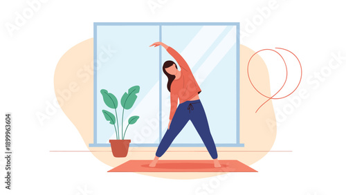 Young woman practicing side stretching yoga pose in her bright living room near a window with a green potted plant.