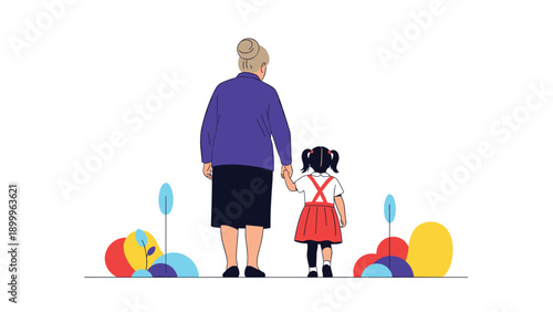 Back view of a grandmother and her young granddaughter holding hands and walking together in a colorful outdoor park.