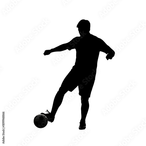 Soccer player kicking ball with dynamic silhouette