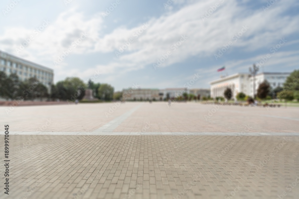 Fototapeta premium Panoramic wide asphalt road and city skyline under