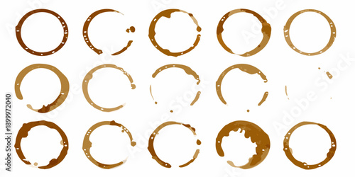 Abstract arrangement of coffee rings and stains on a white background