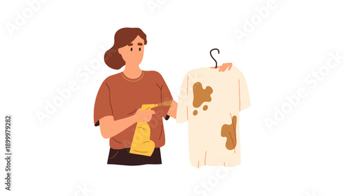 A woman using a cleaning product to remove stains from a shirt