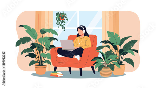 Woman wearing headphones, working on her laptop in a comfortable armchair, surrounded by lush houseplants in a cozy and tranquil room.
