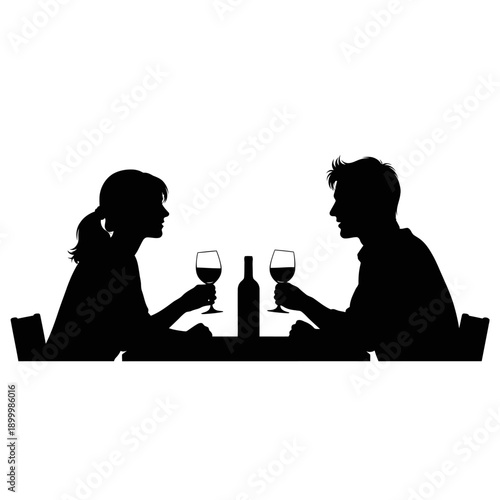 Couple enjoying romantic dinner together with wine
