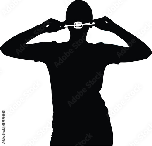 Person in black silhouette brushing teeth with toothbrush against blue background