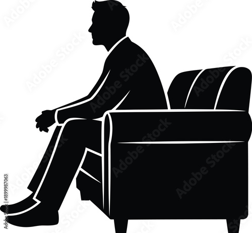 Businessman sitting in chair in contemplative mood