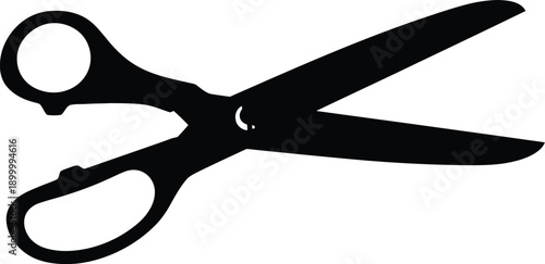 Black scissors on pink background for cutting and crafting needs