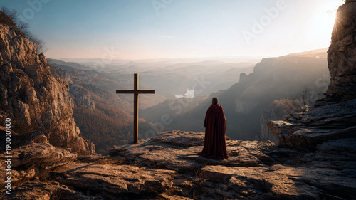 Back view of believer man praying to cross on horizon, beautiful mountains landscape background, clam and peaceful.