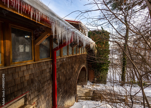 Photography Icicles on the eaves, winter at Riverdale Farm Toronto