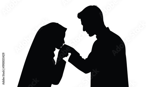 a wife kissing her husband's hand according to Islamic etiquette2