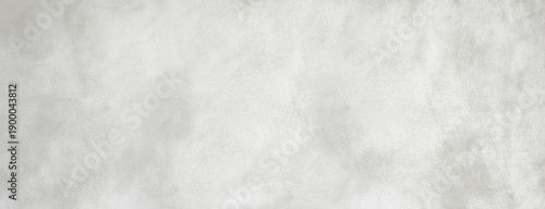 Grey concrete wall presenting abstract rough texture background