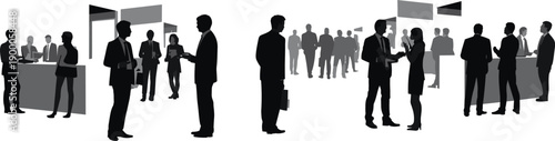 Business people standing and talking in office setting with booths meeting conference
