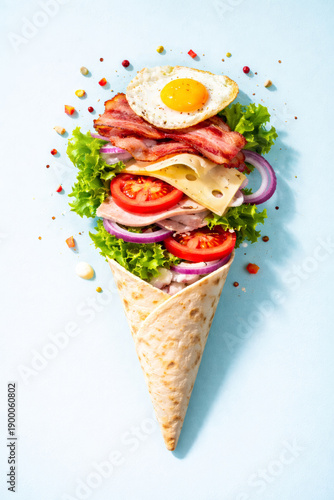 Savory Breakfast Wrap Cone with Bacon, Egg, Cheese and Fresh Vegetables