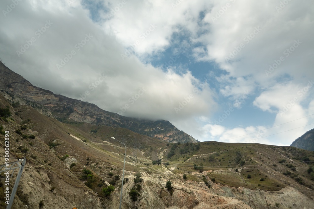 Fototapeta premium Beautiful mountain landscape with sunset sky