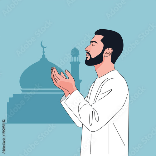 Man in white robes praying with mosque in background
