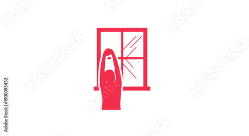 Woman standing by a window sill.