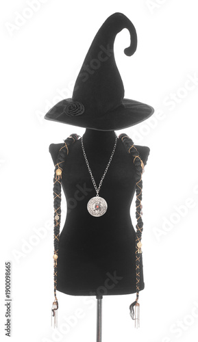 Black silhouette of a witch in a hat isolated on a white background