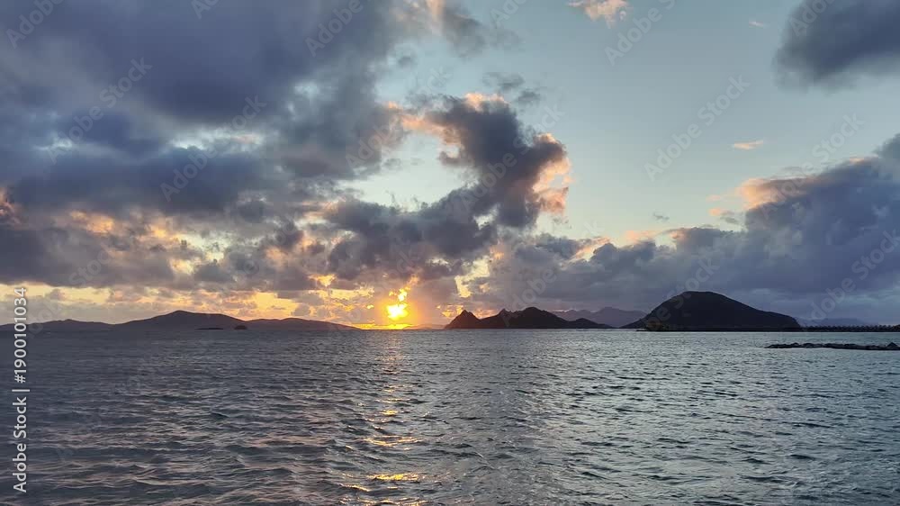 Magnificent sunset on a cloudy day over the Aegean Sea in autumn.	
