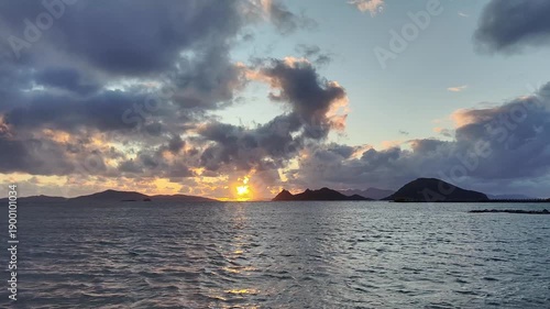 Magnificent sunset on a cloudy day over the Aegean Sea in autumn.	

