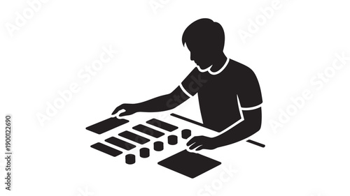 Man working on electronic music equipment in minimalist silhouette style with dramatic lighting on white background for music production