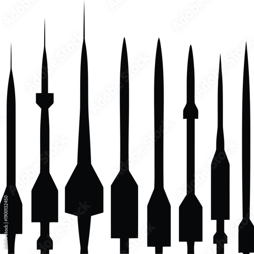 Assorted black silhouettes of various types of historical and modern arrowheads and spear tips Vector
