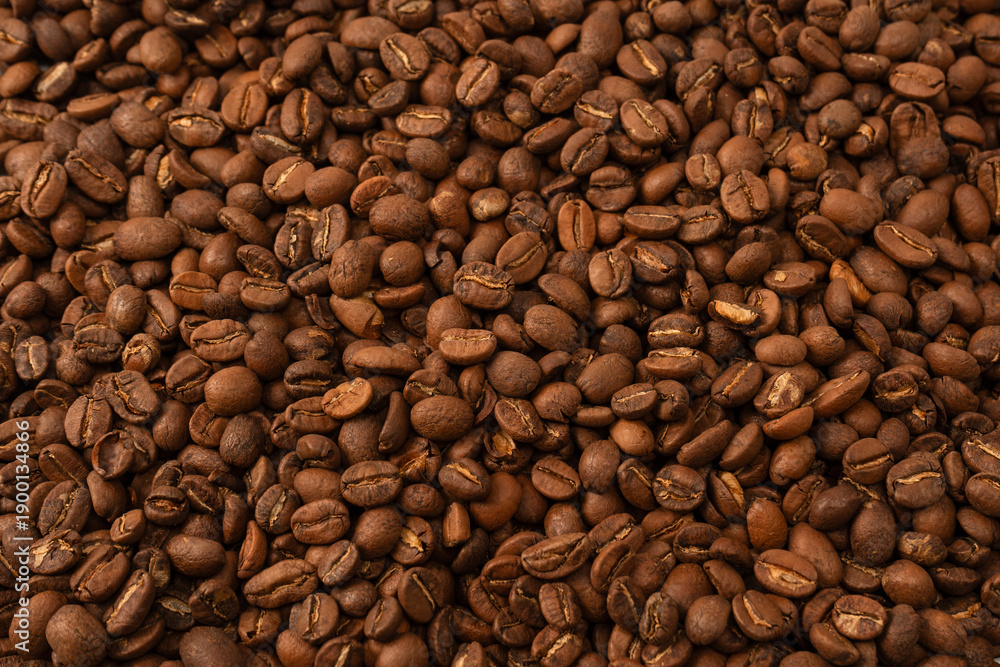 Obraz premium Coffee beans on a white background. Coffee beans texture.