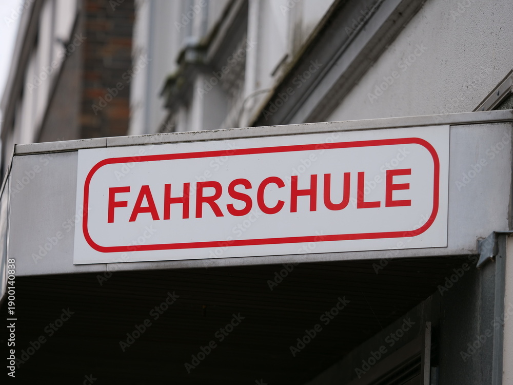 Fototapeta premium German sign pointing to a driving school