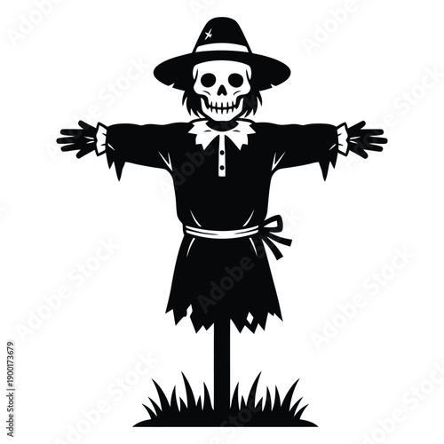 Spooky scarecrow with skull face in black silhouette standing in grass