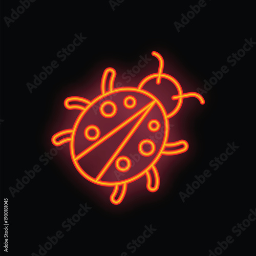 Bright red neon sign is glowing in the dark, taking the shape of a ladybug