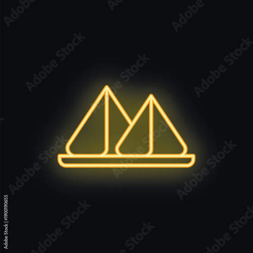 Neon sign showing two samosas on a plate, glowing yellow on a black background