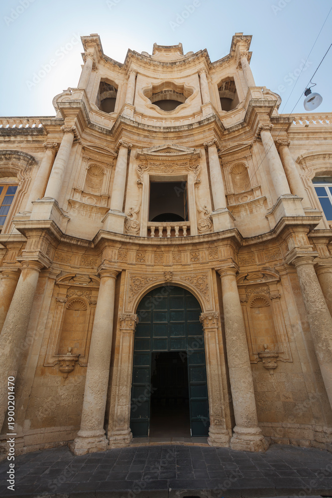 Obraz premium Facade of the Baroque church Chiesa di San Carlo al Corso in Noto, Sicily, Italy, Europe