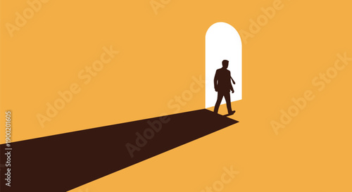 Businessman silhouette walks toward a brightly lit arched doorway casting a long shadow on the ochre floor.
