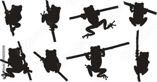 Silhouette of frogs climbing poles in various positions