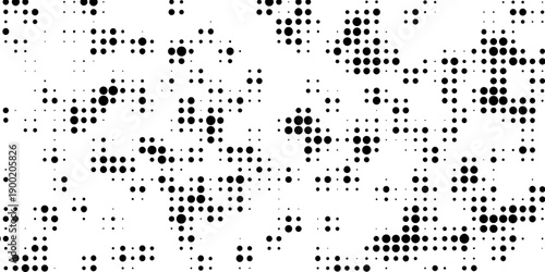 Abstract pop art halftone and seamless vintage distressed small dot background pattern, black and white abstract image displaying a dense randomized pattern of small circular dots across the design.