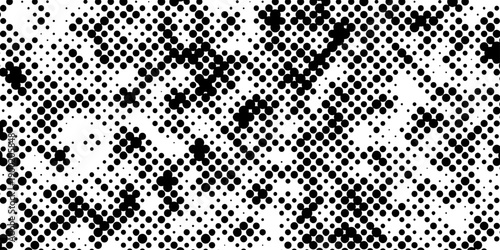 Abstract pop art halftone and seamless vintage distressed small dot background pattern, black and white abstract image displaying a dense randomized pattern of small circular dots across the design.