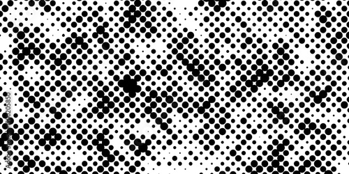 Abstract pop art halftone and seamless vintage distressed small dot background pattern, black and white abstract image displaying a dense randomized pattern of small circular dots across the design.