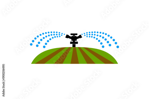 Watering system sprays water over green fields during daytime to support crop growth in agricultural land