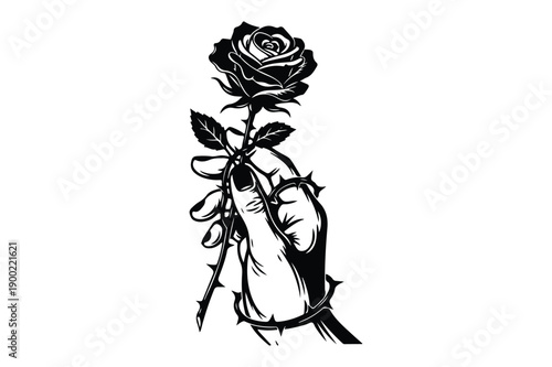 Hand holding a rose with thorns and vines, dark romance