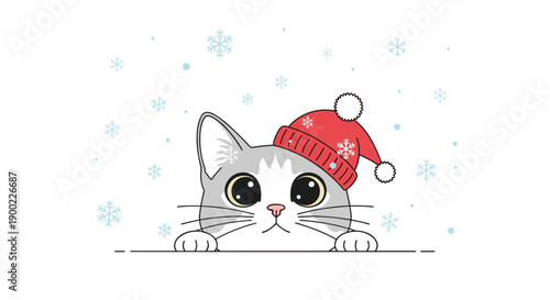Curious kitten wearing a festive red winter hat peeking playfully from below amidst falling snowflakes