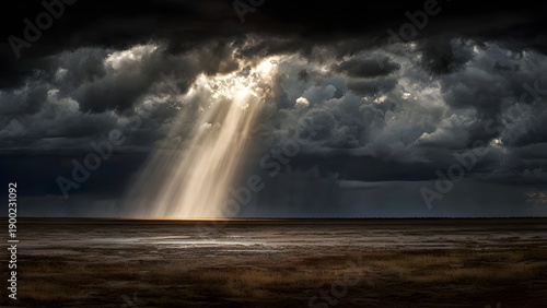 Sunray breaking through dark storm clouds

