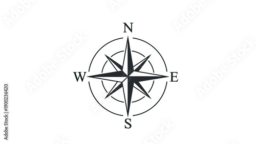 A black compass rose on white. Points marked N, E, S, W, and two concentric circles