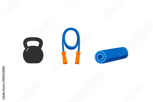 Fitness equipment including kettlebell, jump rope, and yoga mat ready for workout at home gym space in the morning