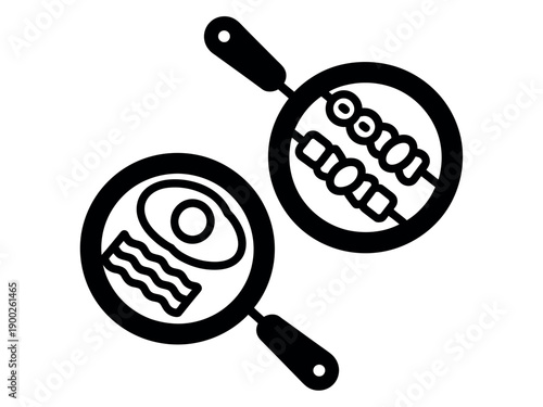 A black and white illustration of two frying pans with food on a clean background